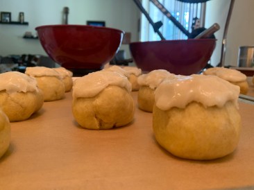 close up of shaped semitas, topped with cubierta