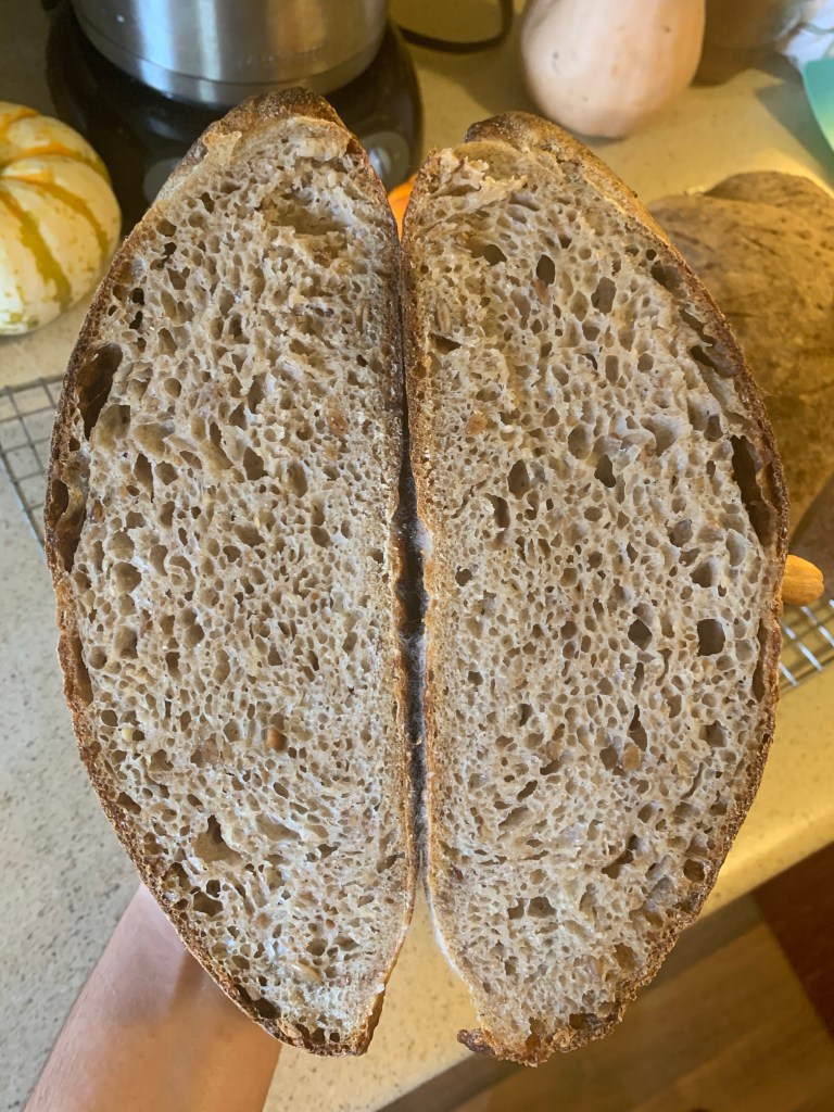 Two halves of bread, showing inner crumb